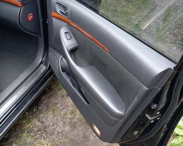 Черный Тойота Авенсис, объемом двигателя 1.79 л и пробегом 218 тыс. км за 7200 $, фото 11 на Automoto.ua