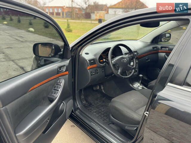 Черный Тойота Авенсис, объемом двигателя 1.8 л и пробегом 178 тыс. км за 7150 $, фото 13 на Automoto.ua