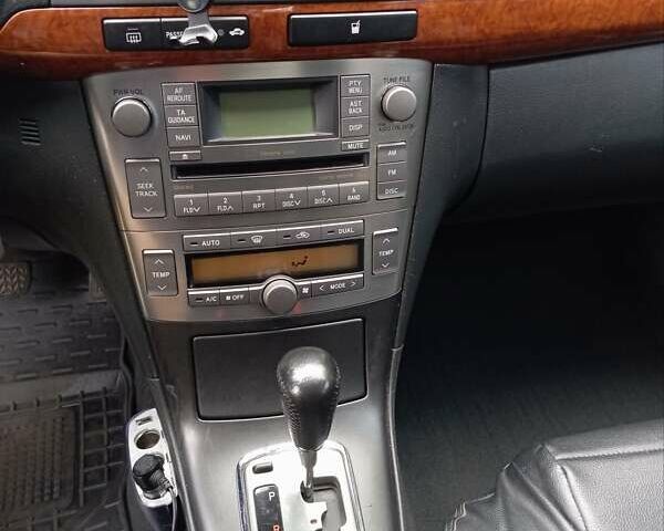 Черный Тойота Авенсис, объемом двигателя 1.79 л и пробегом 218 тыс. км за 7200 $, фото 2 на Automoto.ua
