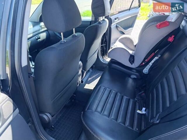 Черный Тойота Авенсис, объемом двигателя 2 л и пробегом 220 тыс. км за 6500 $, фото 9 на Automoto.ua