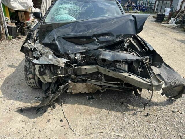 Черный Тойота Авенсис, объемом двигателя 1.8 л и пробегом 1000 тыс. км за 4000 $, фото 1 на Automoto.ua