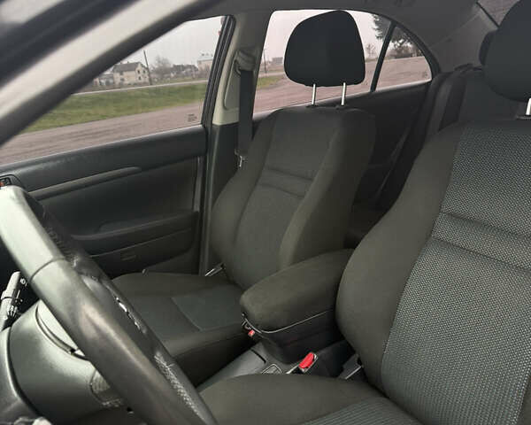 Чорний Тойота Авенсіс, об'ємом двигуна 1.79 л та пробігом 180 тис. км за 7590 $, фото 19 на Automoto.ua