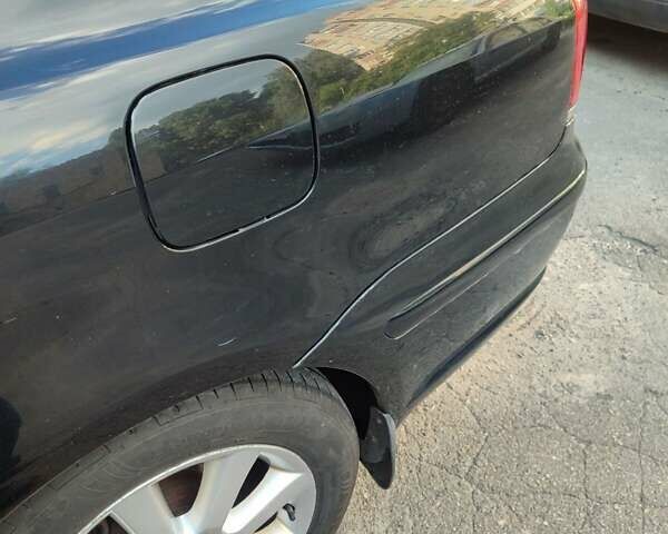 Черный Тойота Авенсис, объемом двигателя 1.8 л и пробегом 320 тыс. км за 7200 $, фото 11 на Automoto.ua