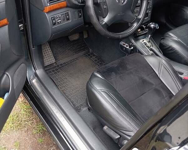 Черный Тойота Авенсис, объемом двигателя 1.79 л и пробегом 218 тыс. км за 7200 $, фото 4 на Automoto.ua