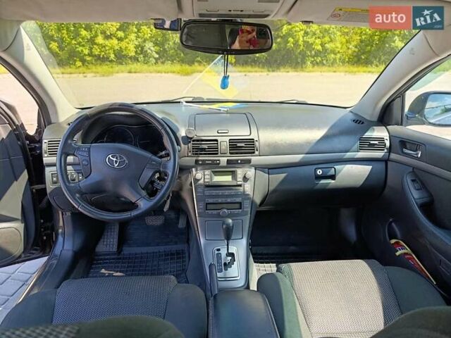 Черный Тойота Авенсис, объемом двигателя 2 л и пробегом 220 тыс. км за 6500 $, фото 7 на Automoto.ua