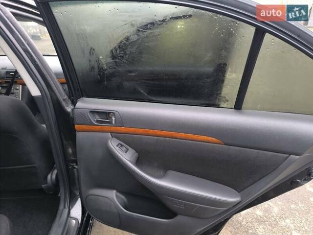 Черный Тойота Авенсис, объемом двигателя 1.8 л и пробегом 190 тыс. км за 7100 $, фото 9 на Automoto.ua