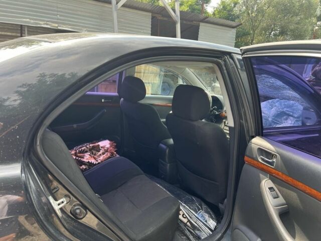 Черный Тойота Авенсис, объемом двигателя 1.8 л и пробегом 1000 тыс. км за 4000 $, фото 5 на Automoto.ua