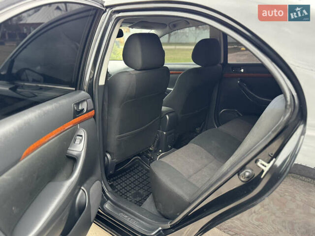 Черный Тойота Авенсис, объемом двигателя 1.8 л и пробегом 178 тыс. км за 7150 $, фото 14 на Automoto.ua