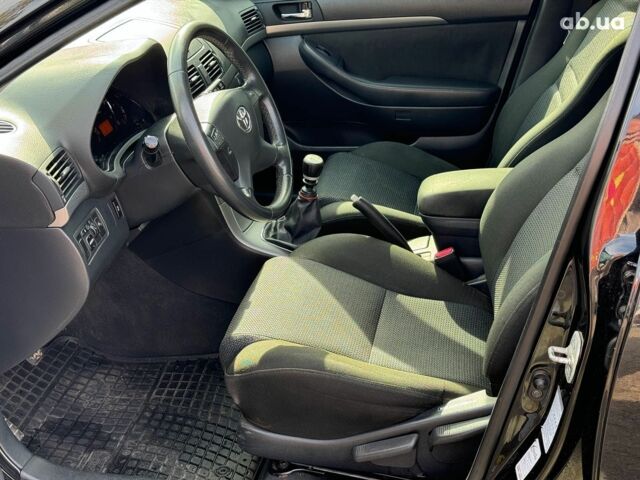 Чорний Тойота Авенсіс, об'ємом двигуна 2 л та пробігом 264 тис. км за 7190 $, фото 12 на Automoto.ua