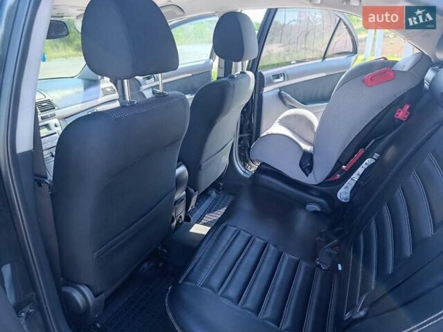 Черный Тойота Авенсис, объемом двигателя 2 л и пробегом 220 тыс. км за 6500 $, фото 3 на Automoto.ua