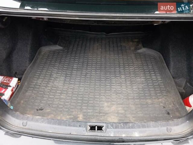 Черный Тойота Авенсис, объемом двигателя 1.79 л и пробегом 218 тыс. км за 7200 $, фото 20 на Automoto.ua