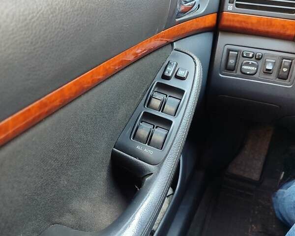 Черный Тойота Авенсис, объемом двигателя 1.8 л и пробегом 320 тыс. км за 7200 $, фото 2 на Automoto.ua