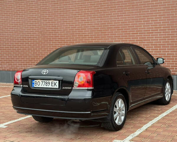 Черный Тойота Авенсис, объемом двигателя 1.79 л и пробегом 243 тыс. км за 7500 $, фото 24 на Automoto.ua