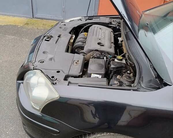 Черный Тойота Авенсис, объемом двигателя 1.8 л и пробегом 256 тыс. км за 7999 $, фото 24 на Automoto.ua