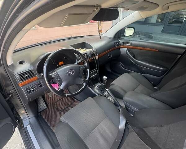 Черный Тойота Авенсис, объемом двигателя 1.79 л и пробегом 198 тыс. км за 4950 $, фото 6 на Automoto.ua