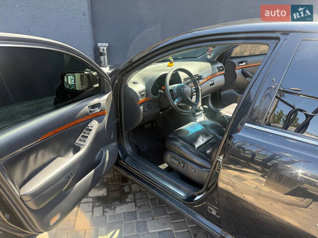 Чорний Тойота Авенсіс, об'ємом двигуна 2 л та пробігом 210 тис. км за 7500 $, фото 5 на Automoto.ua