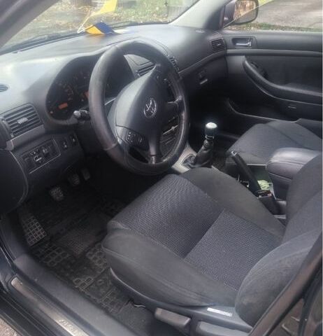 Черный Тойота Авенсис, объемом двигателя 2 л и пробегом 257 тыс. км за 5900 $, фото 5 на Automoto.ua