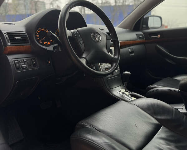 Черный Тойота Авенсис, объемом двигателя 1.79 л и пробегом 243 тыс. км за 7500 $, фото 16 на Automoto.ua