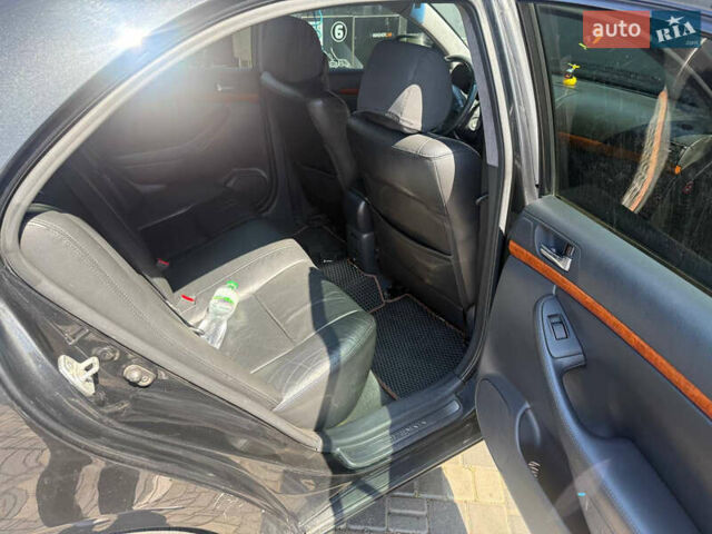Чорний Тойота Авенсіс, об'ємом двигуна 2 л та пробігом 210 тис. км за 7500 $, фото 3 на Automoto.ua