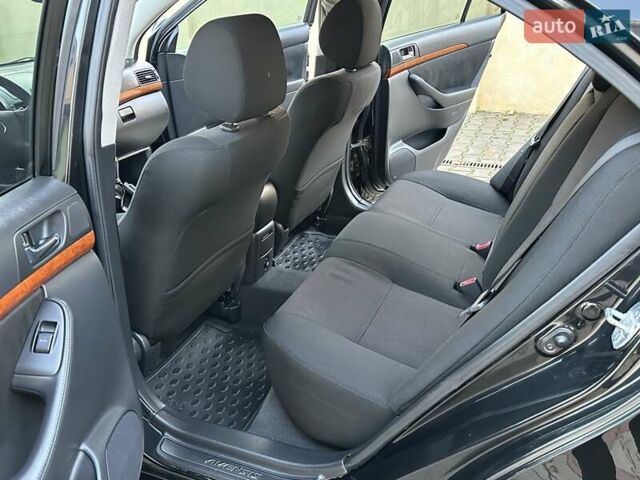 Чорний Тойота Авенсіс, об'ємом двигуна 1.8 л та пробігом 136 тис. км за 8300 $, фото 45 на Automoto.ua