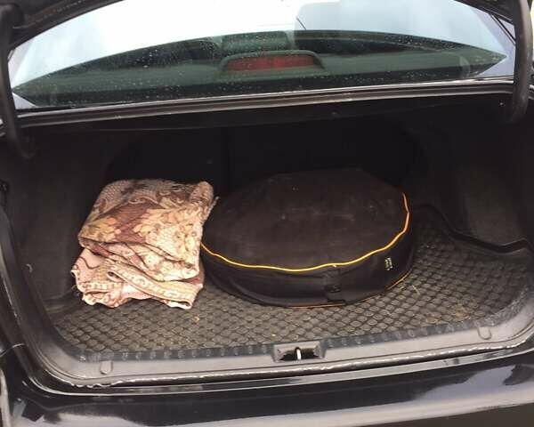 Черный Тойота Авенсис, объемом двигателя 1.8 л и пробегом 260 тыс. км за 7500 $, фото 8 на Automoto.ua