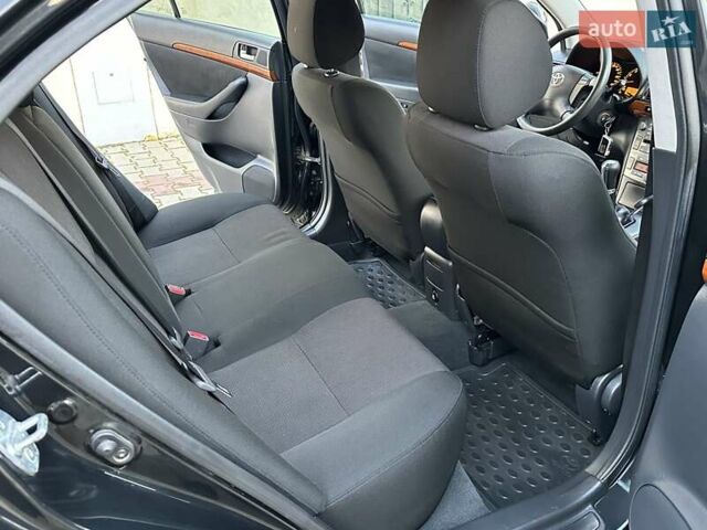 Чорний Тойота Авенсіс, об'ємом двигуна 1.8 л та пробігом 136 тис. км за 8300 $, фото 48 на Automoto.ua