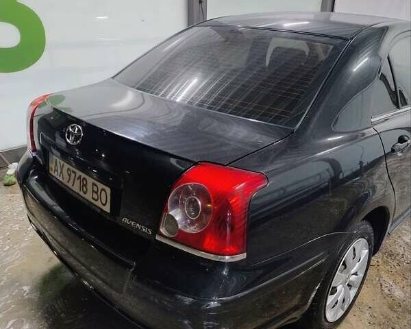 Черный Тойота Авенсис, объемом двигателя 1.8 л и пробегом 256 тыс. км за 7999 $, фото 1 на Automoto.ua