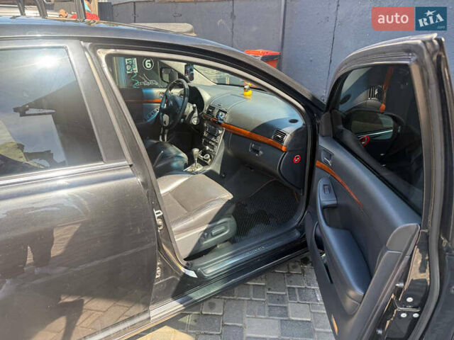 Чорний Тойота Авенсіс, об'ємом двигуна 2 л та пробігом 210 тис. км за 7500 $, фото 2 на Automoto.ua