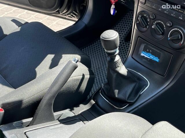 Чорний Тойота Авенсіс, об'ємом двигуна 2 л та пробігом 330 тис. км за 7690 $, фото 12 на Automoto.ua