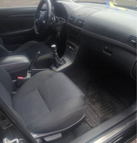 Черный Тойота Авенсис, объемом двигателя 2 л и пробегом 257 тыс. км за 5900 $, фото 4 на Automoto.ua