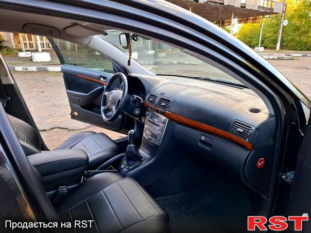 Черный Тойота Авенсис, объемом двигателя 1.8 л и пробегом 183 тыс. км за 7500 $, фото 9 на Automoto.ua