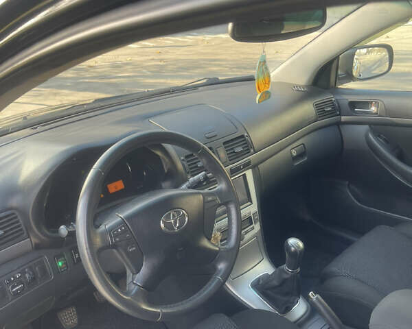 Черный Тойота Авенсис, объемом двигателя 1.79 л и пробегом 130 тыс. км за 7500 $, фото 13 на Automoto.ua