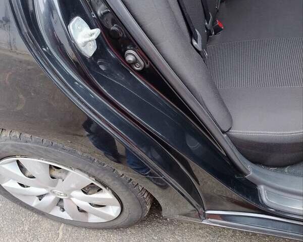 Черный Тойота Авенсис, объемом двигателя 1.8 л и пробегом 256 тыс. км за 7999 $, фото 13 на Automoto.ua