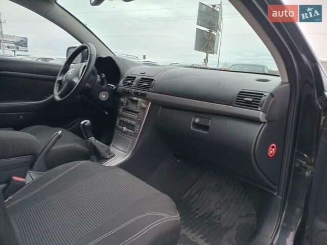 Черный Тойота Авенсис, объемом двигателя 1.8 л и пробегом 297 тыс. км за 7490 $, фото 23 на Automoto.ua