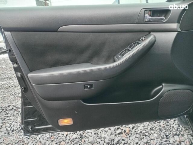 Черный Тойота Авенсис, объемом двигателя 1.8 л и пробегом 297 тыс. км за 7490 $, фото 13 на Automoto.ua