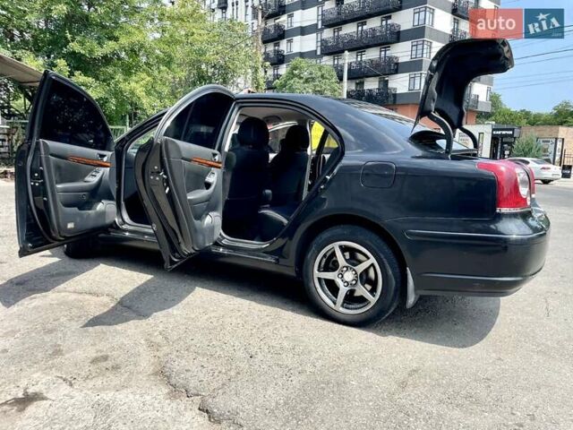 Черный Тойота Авенсис, объемом двигателя 1.8 л и пробегом 225 тыс. км за 6800 $, фото 7 на Automoto.ua