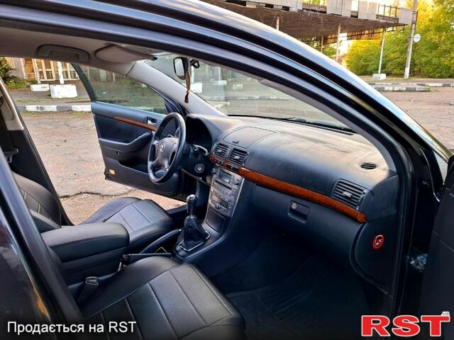 Черный Тойота Авенсис, объемом двигателя 1.8 л и пробегом 183 тыс. км за 7500 $, фото 6 на Automoto.ua