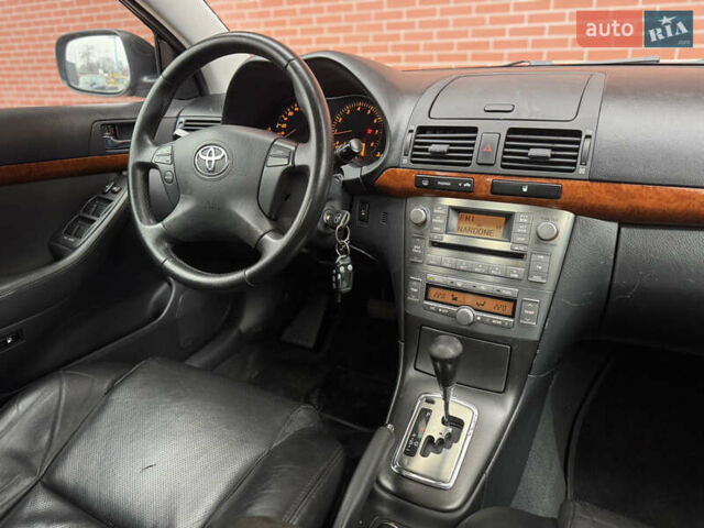 Черный Тойота Авенсис, объемом двигателя 1.79 л и пробегом 243 тыс. км за 7500 $, фото 26 на Automoto.ua