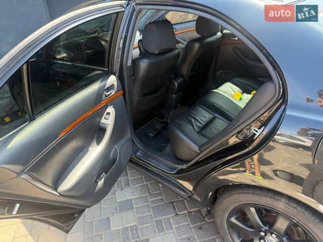 Чорний Тойота Авенсіс, об'ємом двигуна 2 л та пробігом 210 тис. км за 7500 $, фото 7 на Automoto.ua