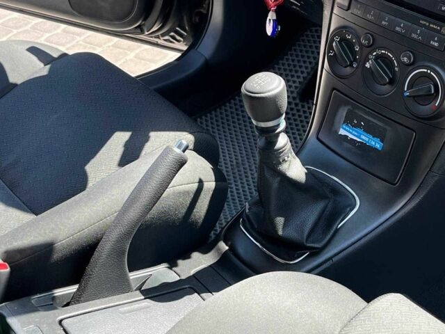 Чорний Тойота Авенсіс, об'ємом двигуна 2 л та пробігом 330 тис. км за 6830 $, фото 12 на Automoto.ua