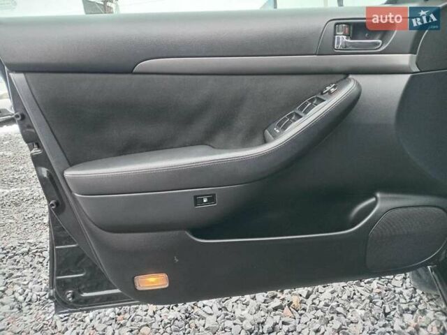 Черный Тойота Авенсис, объемом двигателя 1.8 л и пробегом 297 тыс. км за 7490 $, фото 13 на Automoto.ua