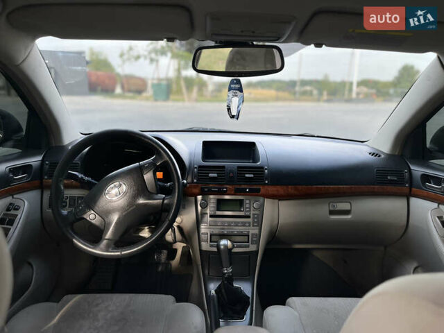 Черный Тойота Авенсис, объемом двигателя 1.8 л и пробегом 233 тыс. км за 6550 $, фото 5 на Automoto.ua