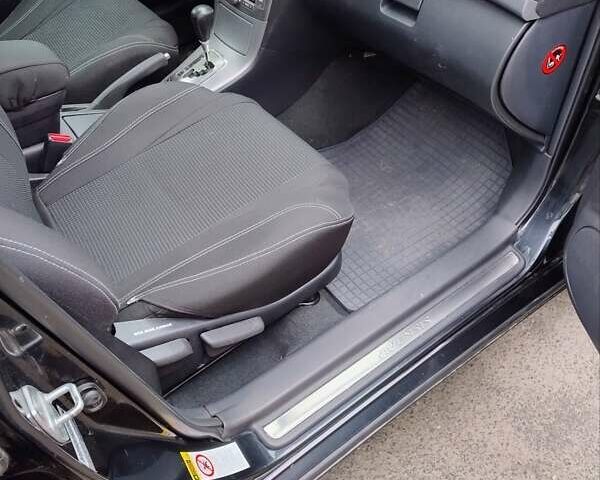 Черный Тойота Авенсис, объемом двигателя 1.8 л и пробегом 256 тыс. км за 7999 $, фото 12 на Automoto.ua