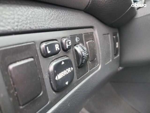 Черный Тойота Авенсис, объемом двигателя 1.8 л и пробегом 297 тыс. км за 7490 $, фото 10 на Automoto.ua