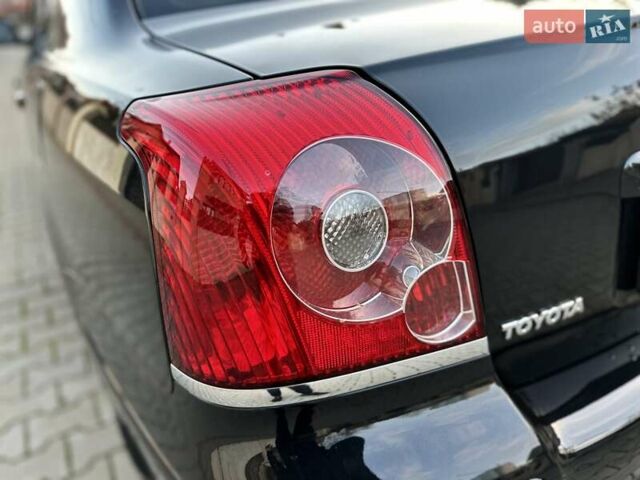 Чорний Тойота Авенсіс, об'ємом двигуна 1.8 л та пробігом 136 тис. км за 8300 $, фото 34 на Automoto.ua