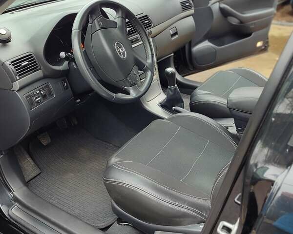 Черный Тойота Авенсис, объемом двигателя 1.8 л и пробегом 163 тыс. км за 8000 $, фото 8 на Automoto.ua