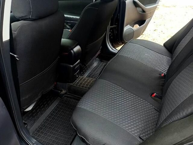 Черный Тойота Авенсис, объемом двигателя 2 л и пробегом 230 тыс. км за 7500 $, фото 7 на Automoto.ua