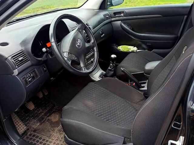 Черный Тойота Авенсис, объемом двигателя 2 л и пробегом 230 тыс. км за 7500 $, фото 9 на Automoto.ua