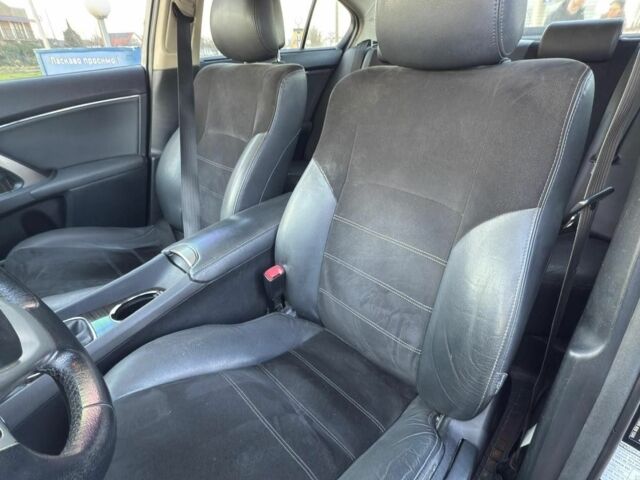 Черный Тойота Авенсис, объемом двигателя 2 л и пробегом 130 тыс. км за 10900 $, фото 7 на Automoto.ua