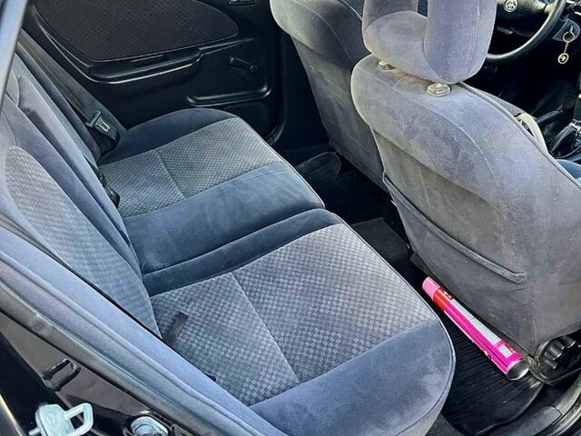 Чорний Тойота Авенсіс, об'ємом двигуна 2 л та пробігом 217 тис. км за 4000 $, фото 2 на Automoto.ua